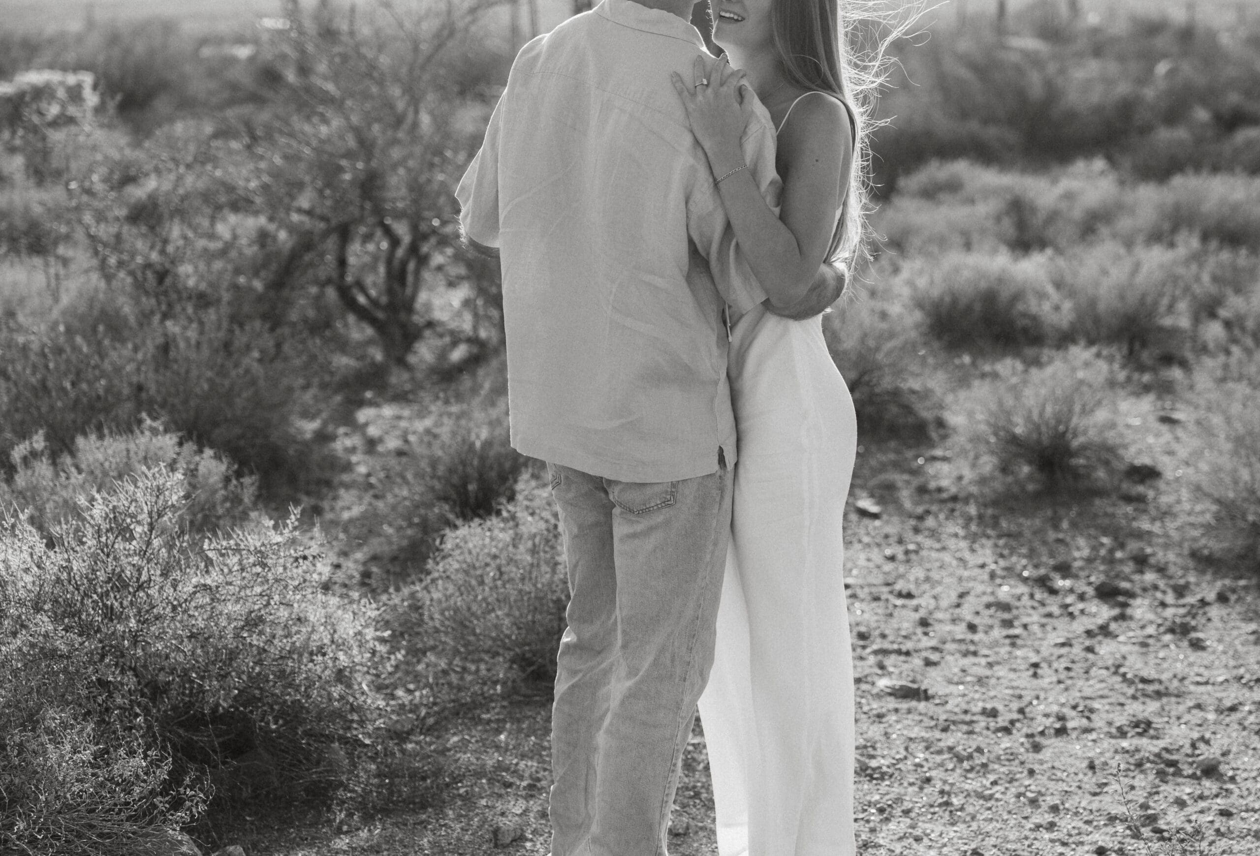 black-and-white-couple-dancing-in-desert