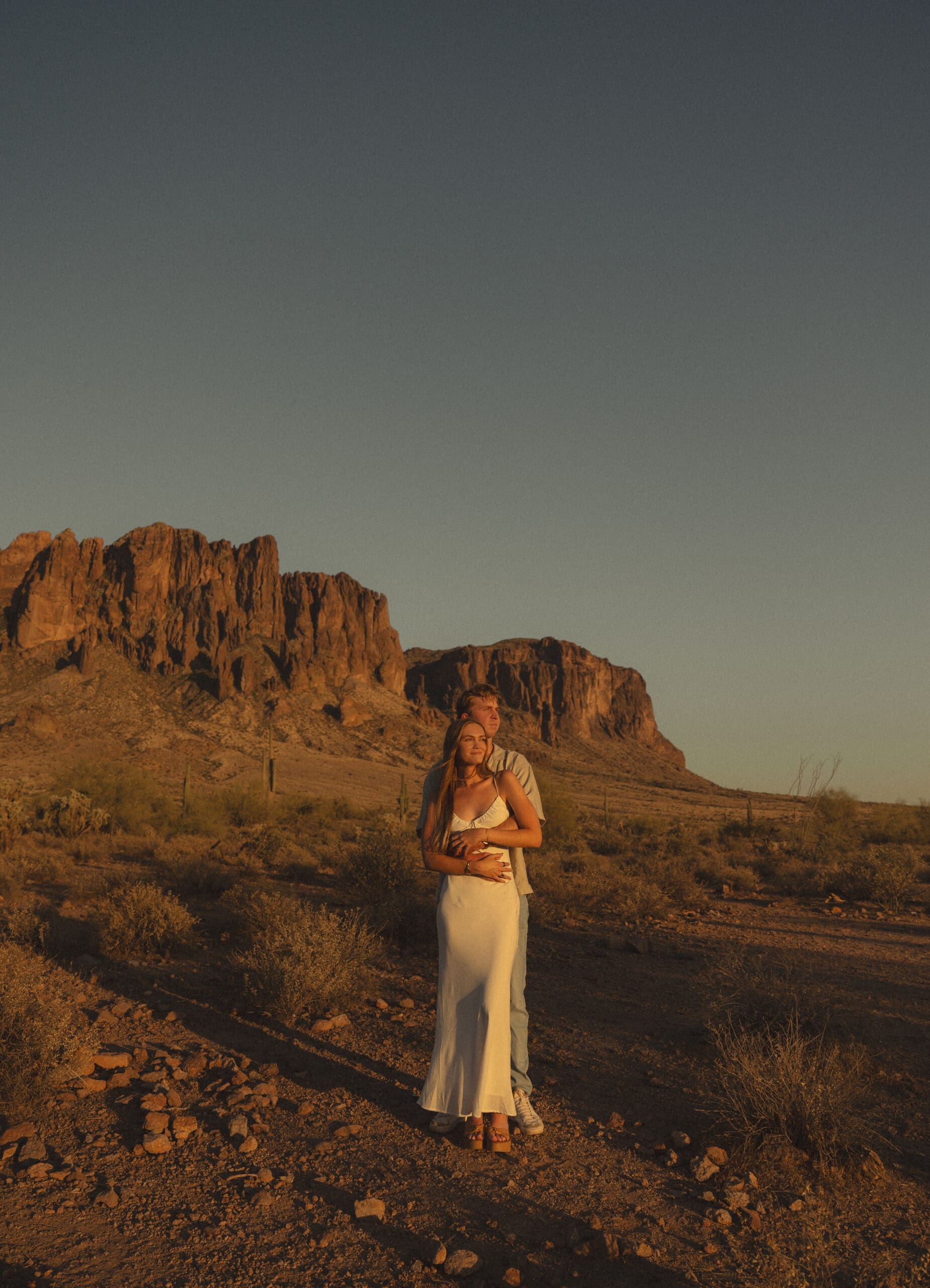 golden-hour-photo-of-couple-hugging-at-lost-dutchman-state-park