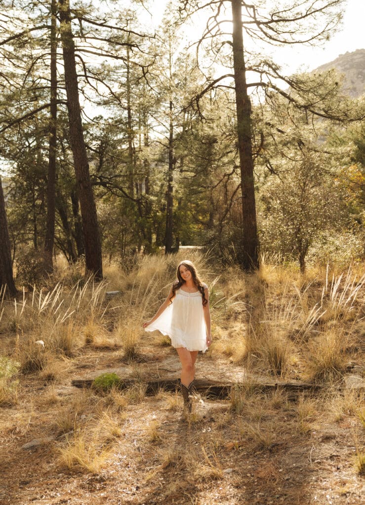 Photograph-of-high-school-senior-girl-walking-through-mt-lemmon-arizona
