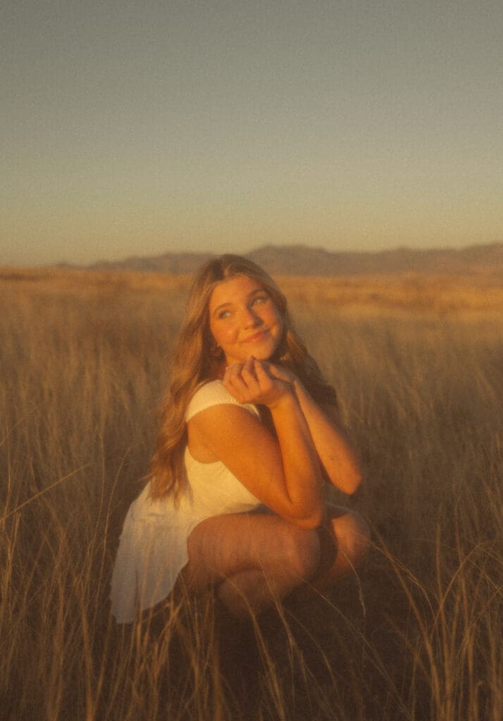 Photograph-of-high-school-senior-girl-in-sonoita-arizona-field